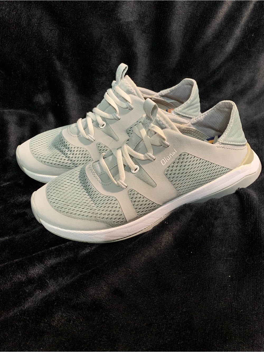 OluKai Women's Slip-On Sneakers in Light Gray and White